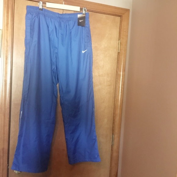Nike  XL Storm Fit Woven Pant - Picture 1 of 7